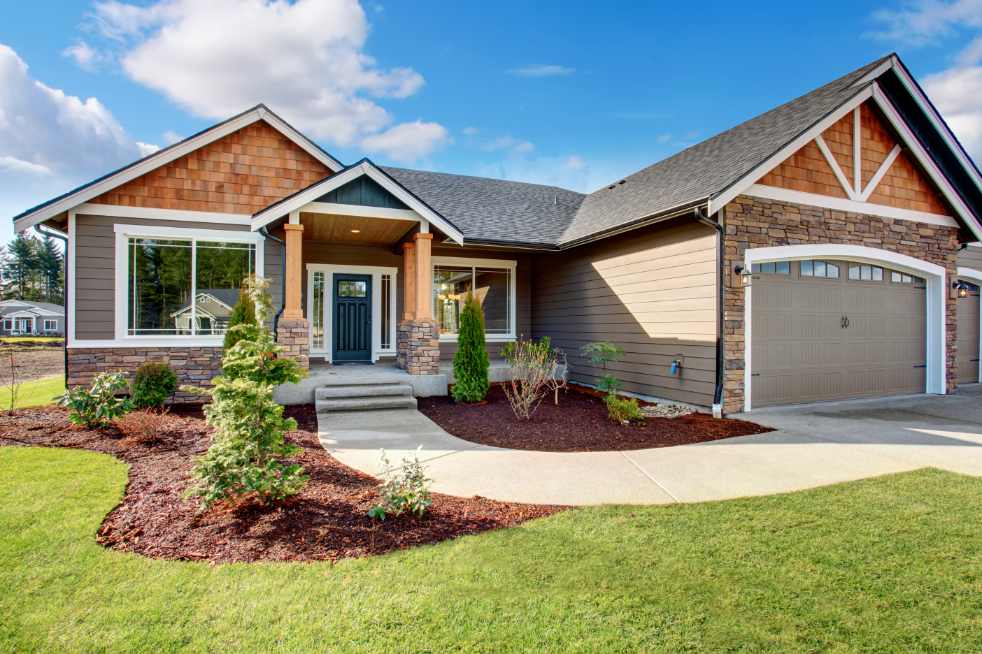 Large modern house with stone and walkway